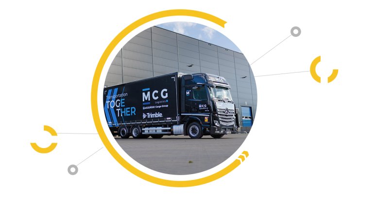 a truck with MCG Logistics logo a truck with MCG Logistics logo