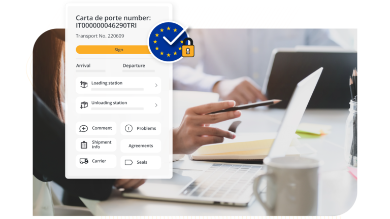 Una aplicación de carta de porte digital mostrada en la pantalla de un ordenador portátil que presenta botones de gestión de transporte y un sello de firma europea segura.