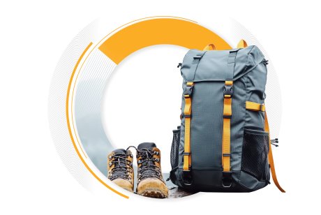 A grey and orange hiking backpack next to a pair of sturdy hiking boots, representing preparation for challenges in freight procurement.