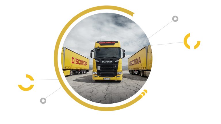 Yellow truck with Discordia logo