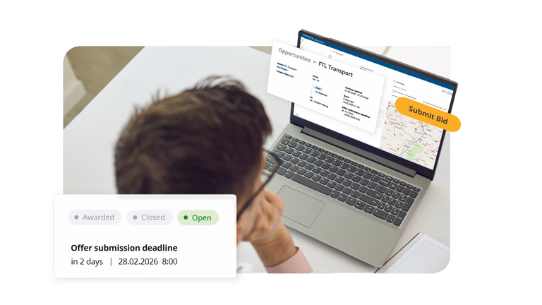 Over-the-shoulder view of a person using a laptop to submit a bid for an FTL transport opportunity on a freight platform.