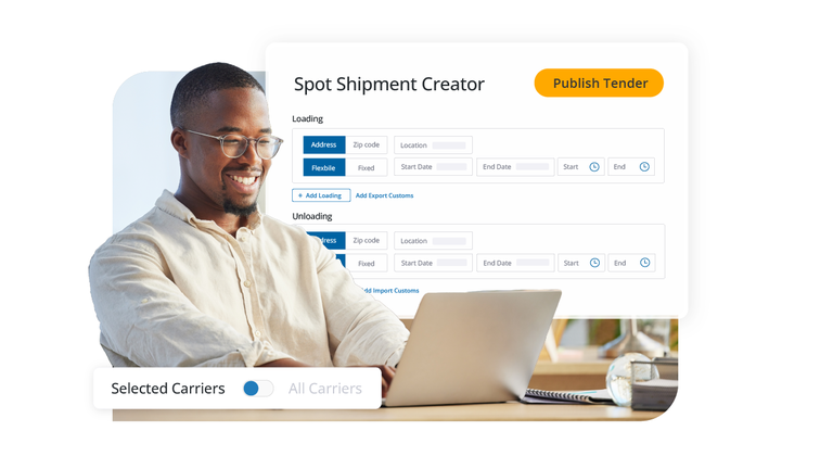 A man smiling while using a laptop to create a spot shipment tender on a professional digital platform.