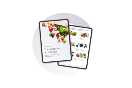 Mockup of two tablets displaying pages from a Transporeon retail whitepaper titled "The adaptive advantage" on a black background with a grey circular pattern.