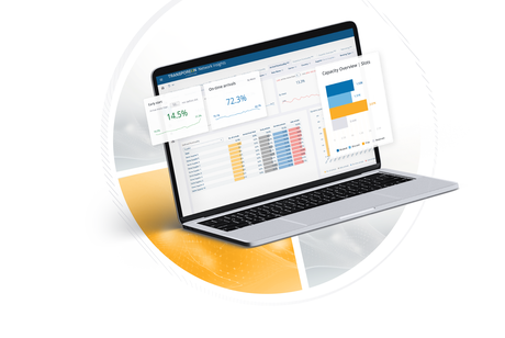 A laptop displaying a modern retail analytics dashboard with colorful charts.