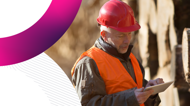 A forestry worker in a red hard hat and high-visibility vest inputs field data on a tablet, with a wavy black and pink graphic overlay on the left.